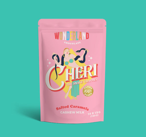 Cheri the snake charmer packaging on a teal backround