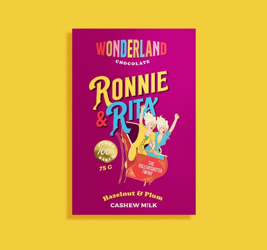 Vegan Hazelnut Chocolate bar on a yellow backround, with Rollercoaster twins Ronnie & Rita on packaging  